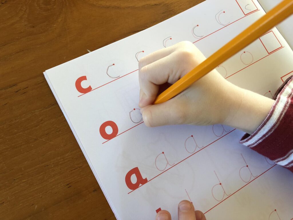 tracing English letters.